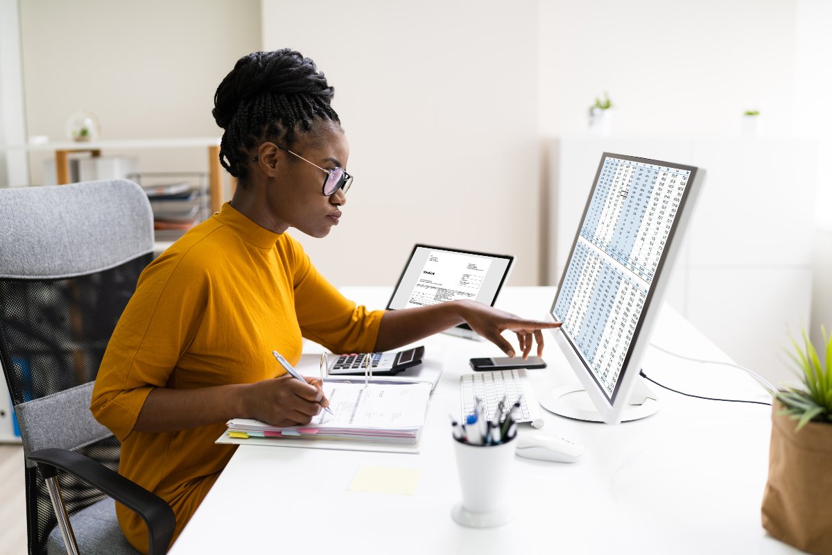 Accountant working on computer.