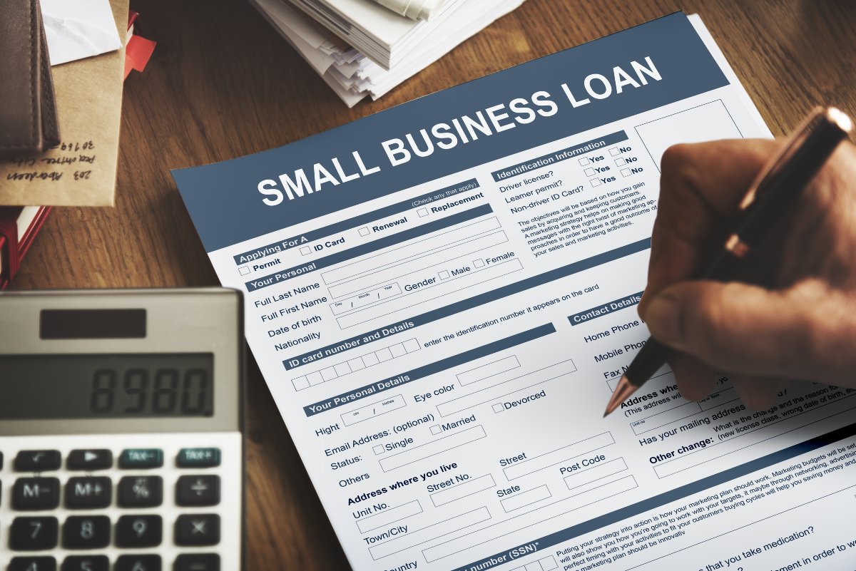 Business owner completing a business loan application
