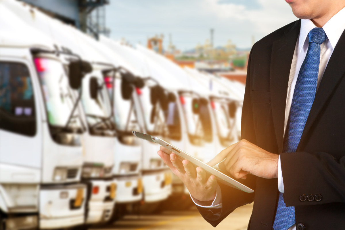 Man working on logistics for vehicle fleet.