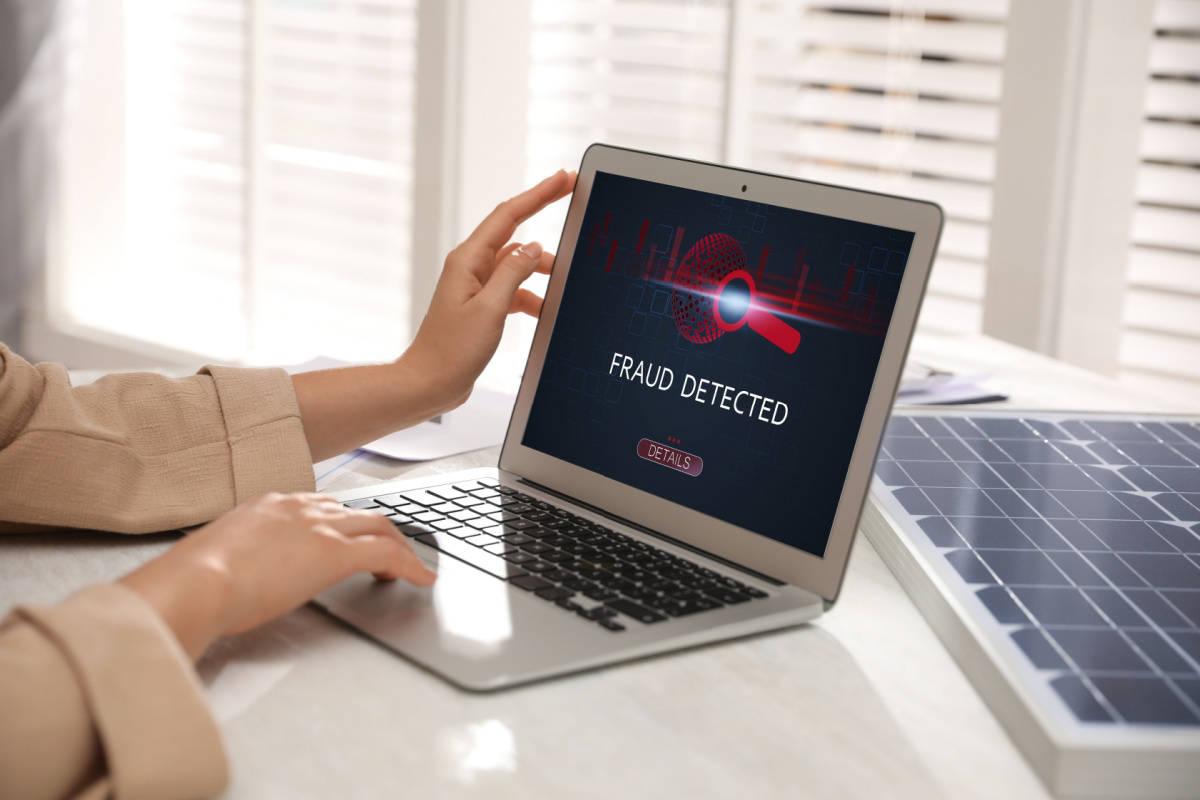 Fraud detected alert on laptop