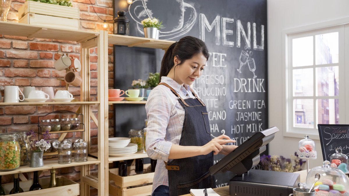 Server using point-of-sale system.