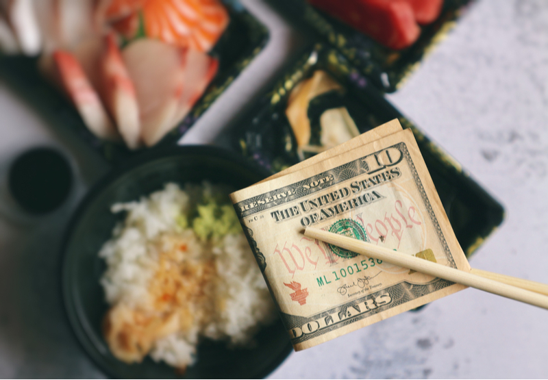Tip money for a restaurant meal.